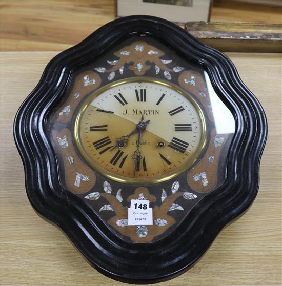 J. Martin. A 19th century wall clock length 62cm